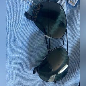 Black aviator ray bans. Bought in 2017. Great condition. A little stretched.